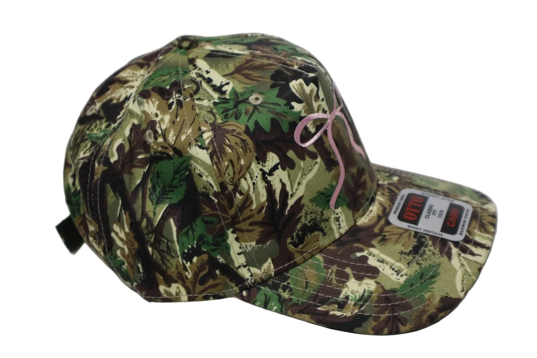 Camouflage-patterned cap with a pink string on a white background
