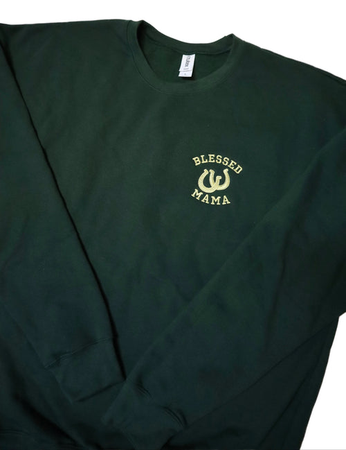Green sweatshirt with 'Blessed Mama' text on a white background